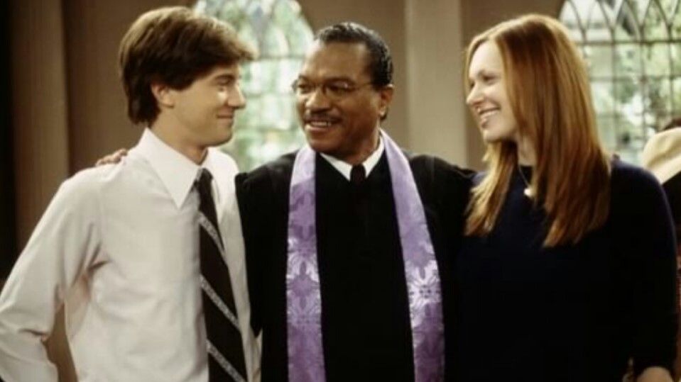 Topher Grace, Billy Dee Williams and Laura Prepon in an episode of That 70s Show
