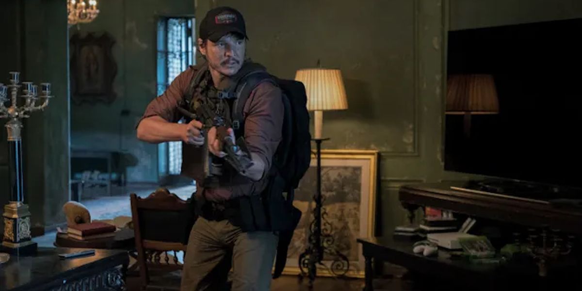 Pedro Pascal as Catfish, holding a gun in Triple Frontier (2019)