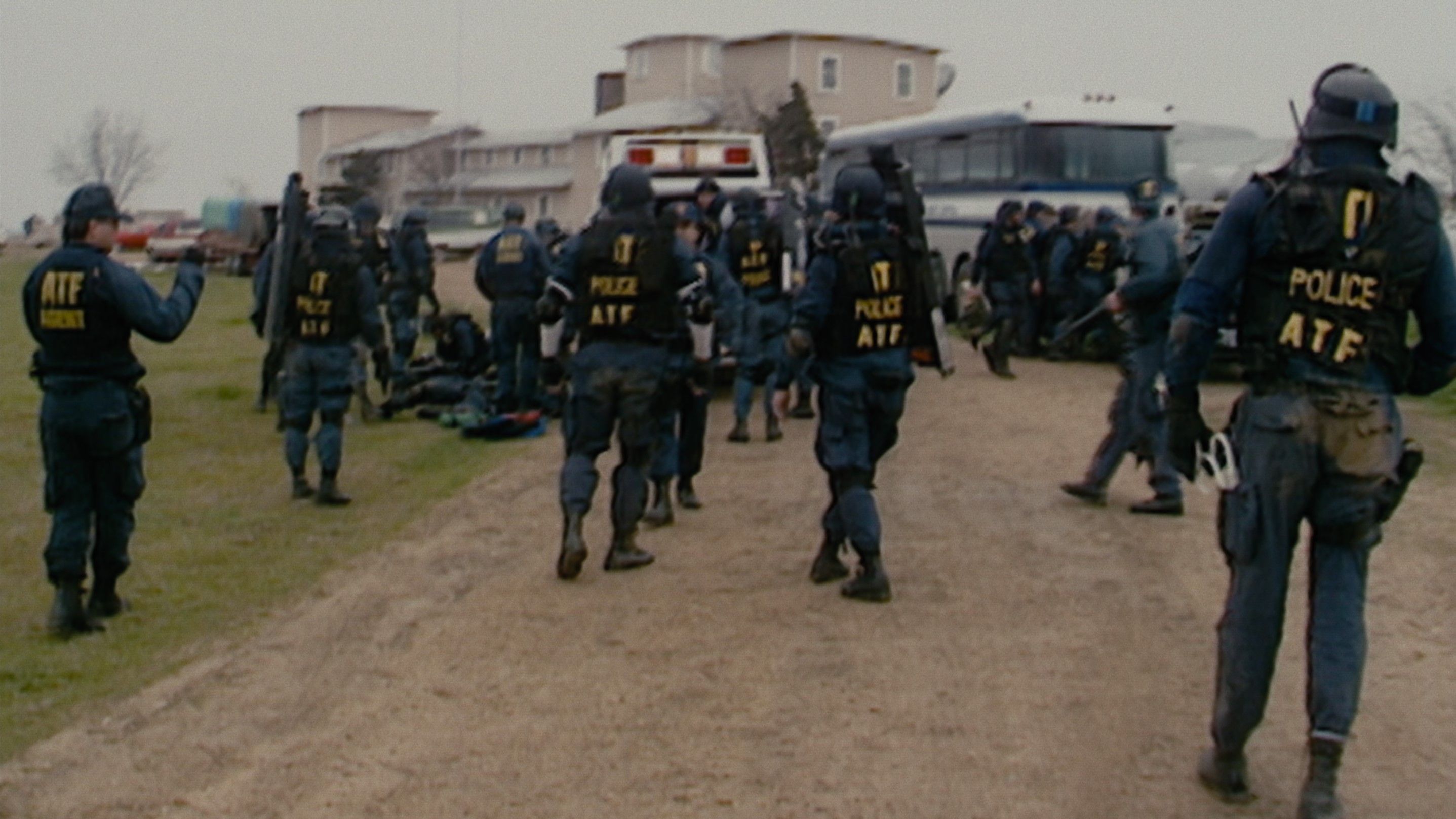 ATF agents raiding the Branch Davidian compound in Waco: American Apocalypse. 