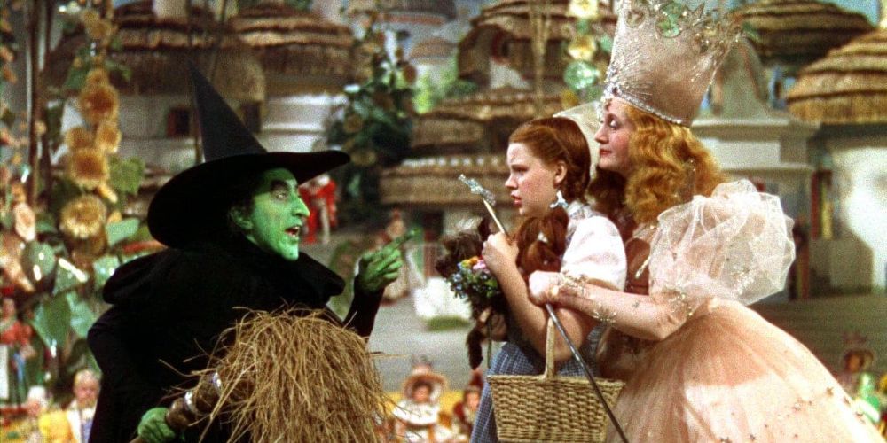 The Wicked Witch of the West threatening Dorothy and Good Witch Glinda in the Wizard of Oz