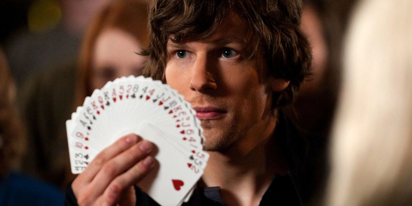 Jesse Eisenberg holding cards in Now You See Me