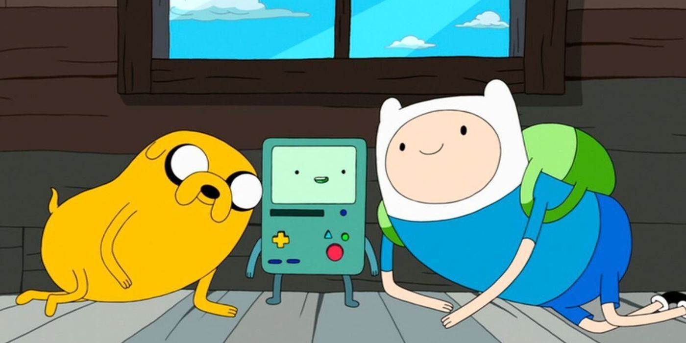 Jake, BMO, and Finn sitting together in their tree house
