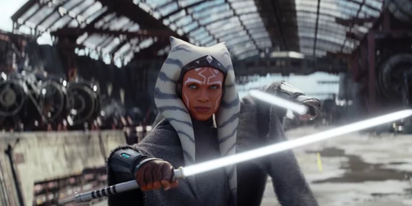 Rosario Dawson as Ahsoka holding up a lightsaber in Ahsoka trailer