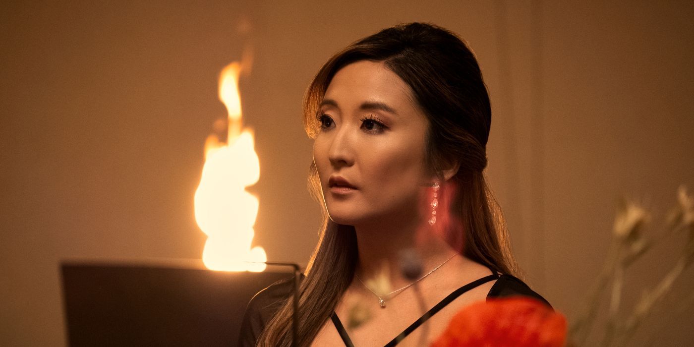 Ashley Park in front of a fire as Naomi Forster in Beef