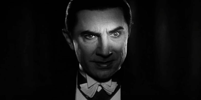 Bela Lugosi as Dracula in the 1931 film, Dracula, his eyes highlighted by the light.