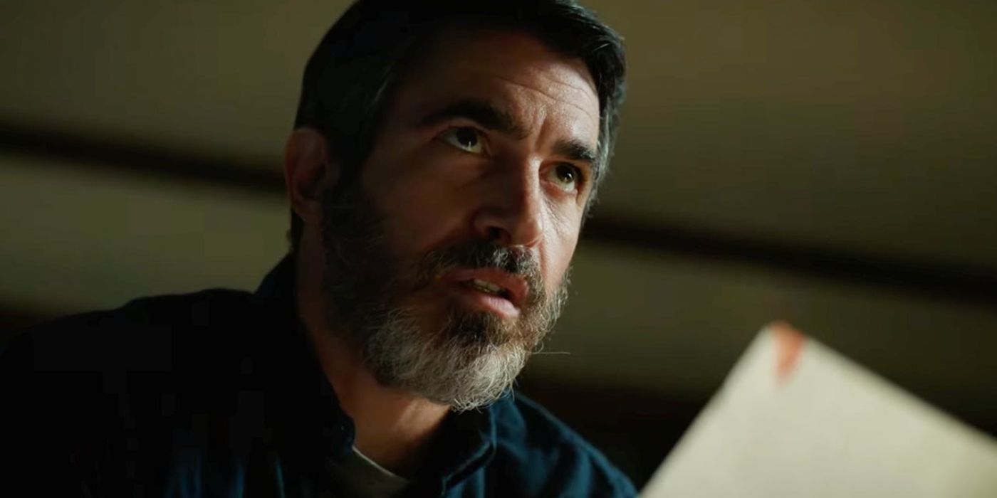 Chris Messina as Will looking up from papers he was reading in The Boogeyman