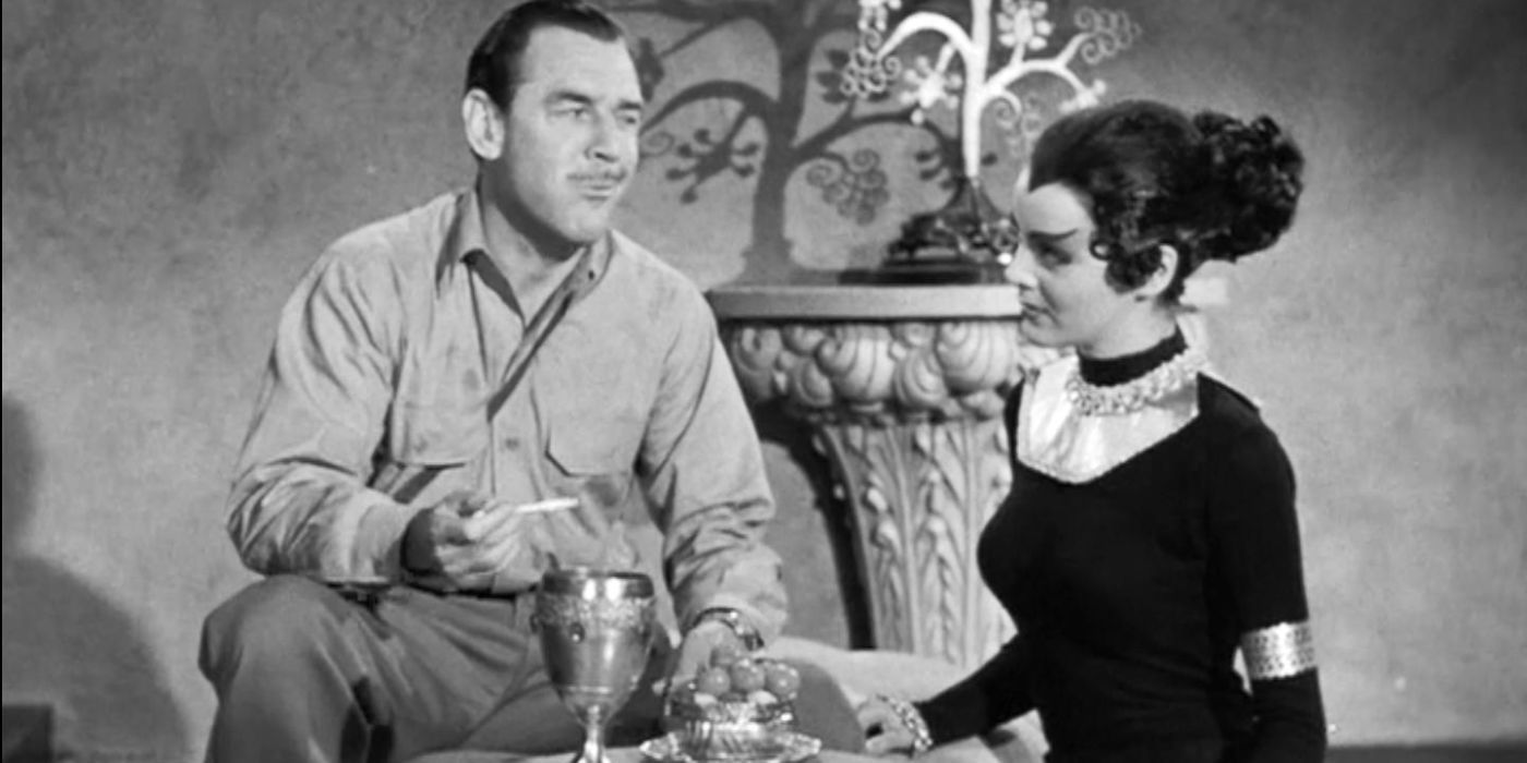 Two characters having lunch in Cat-Women of the Moon