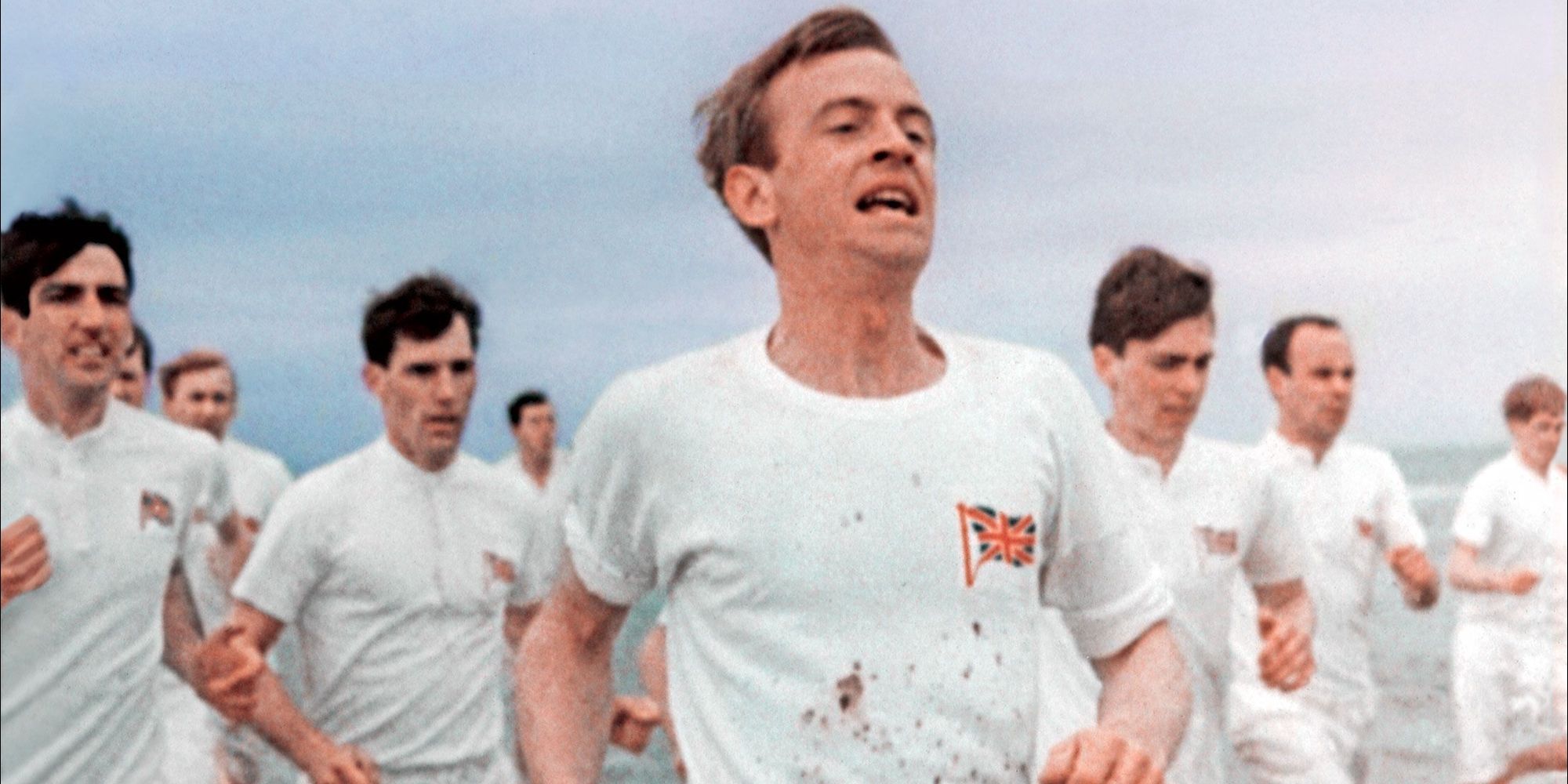 A group of young men running on the beach in Chariots of Fire