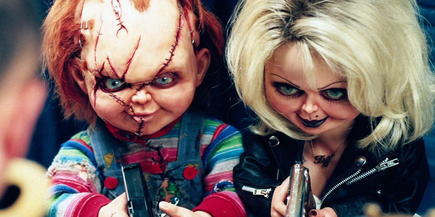 Chucky (voiced by Brad Dourif) and Tiffany (voiced by Jennifer Tilly) holding weapons in Bride of Chucky