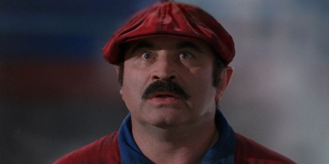 Close up of Bob Hoskins as Mario Mario looking shocked in Super Mario Bros