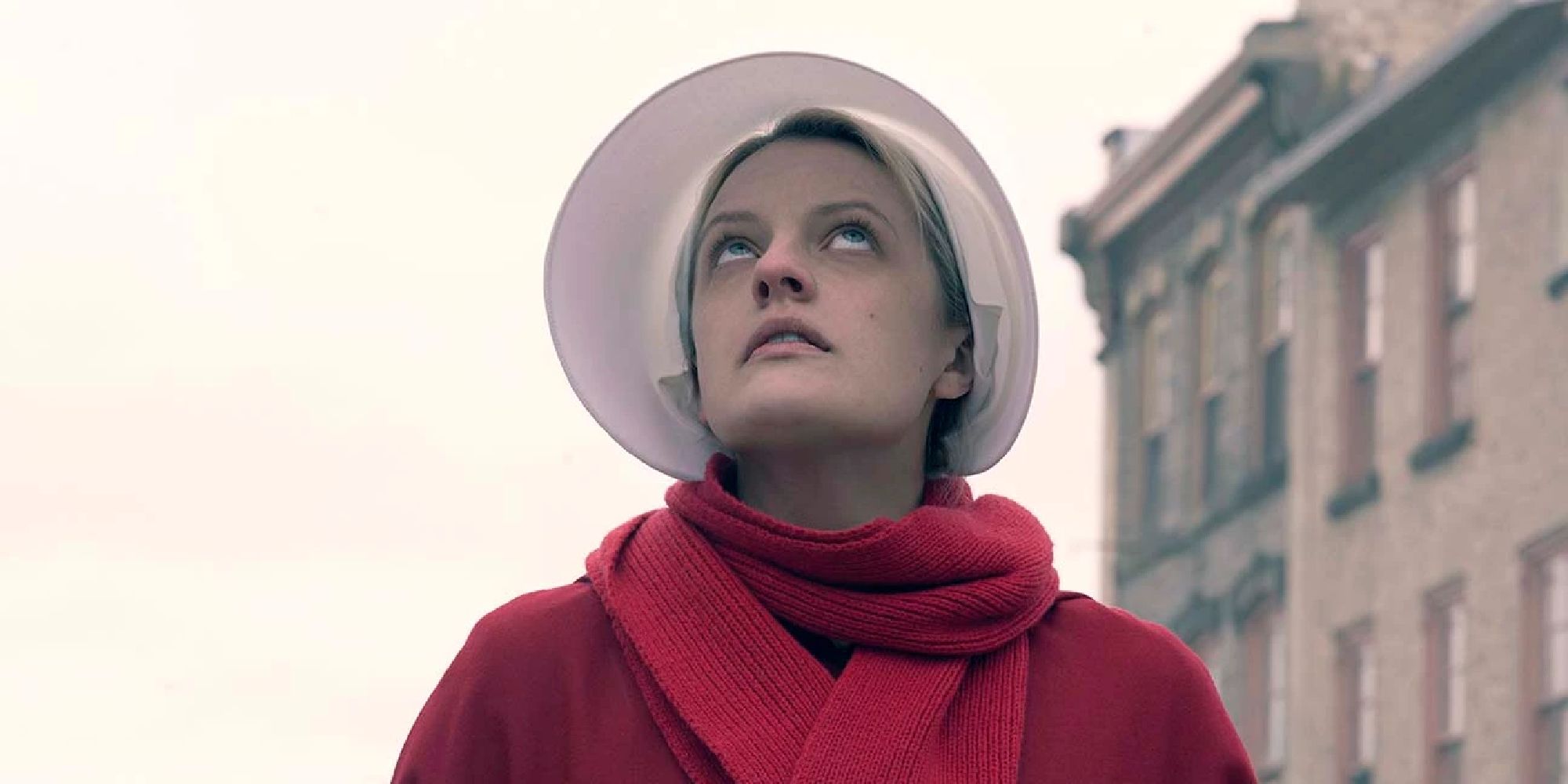 Elisabeth Moss looking up to the sky in The Handmaid's Tale