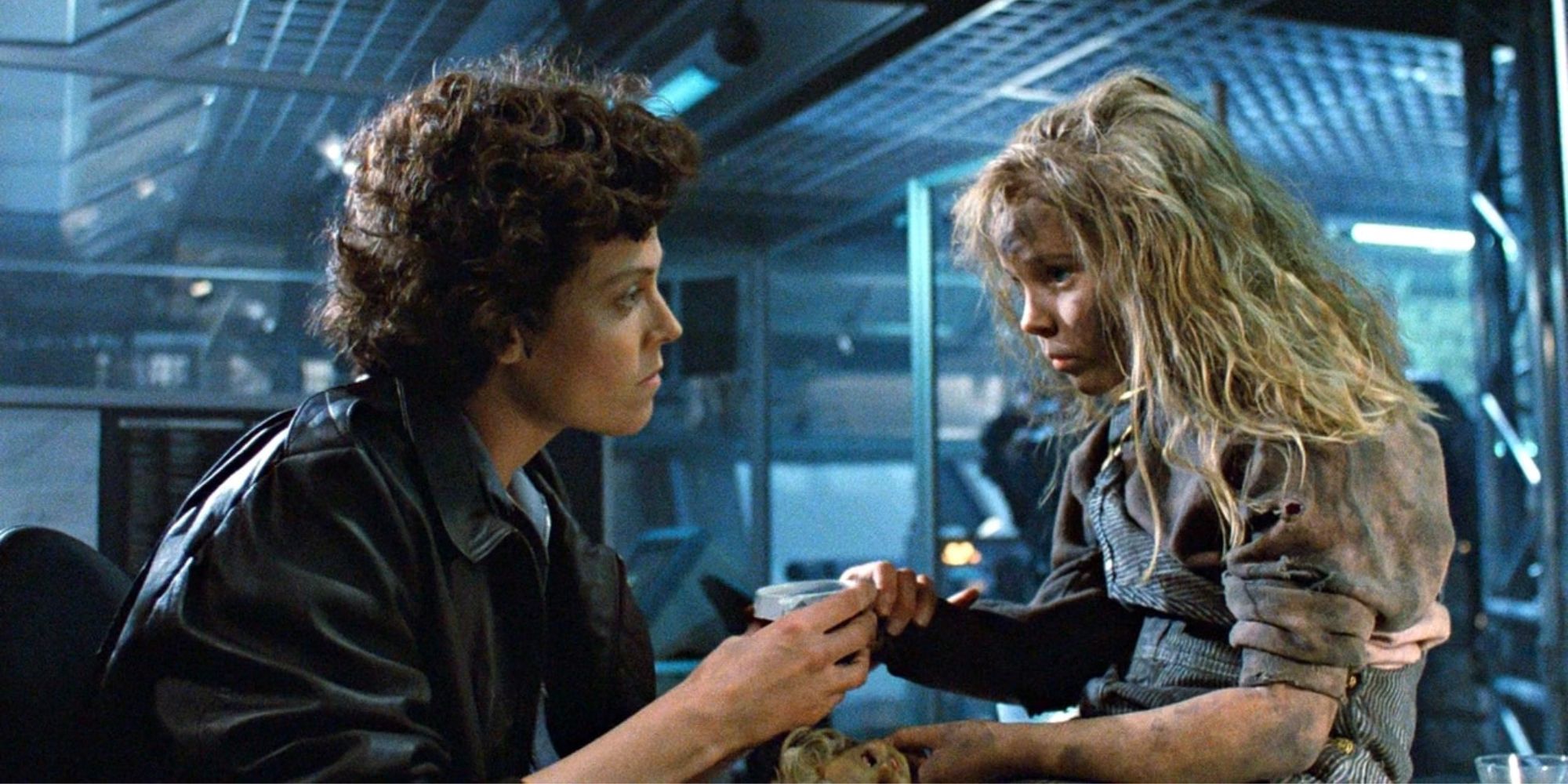 Ellen (Sigourney Weaver) comforting Newt in Alien