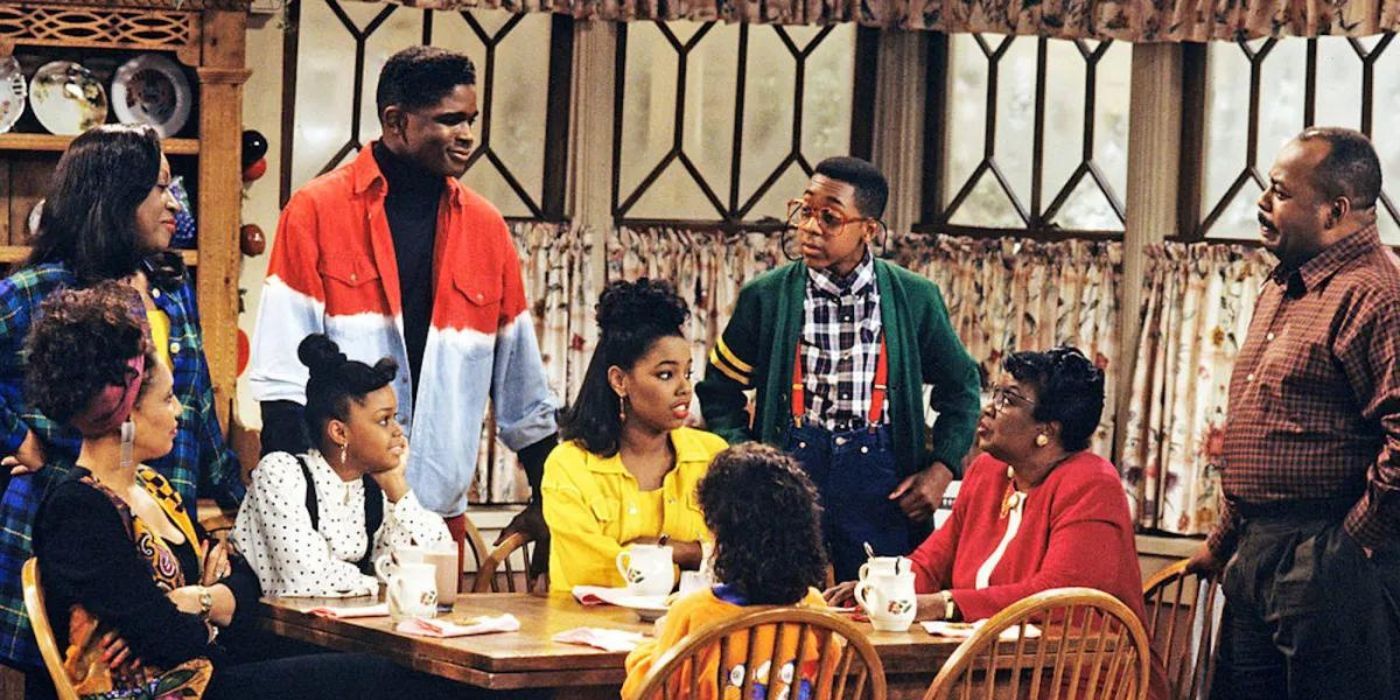 The cast of Family Matters sitting at the dinner table 