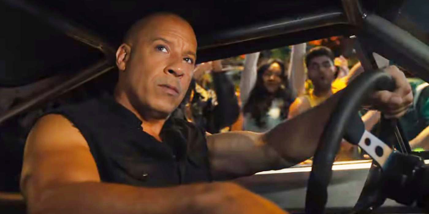 Vin Diesel in Fast X sitting behind the steering wheel of a car