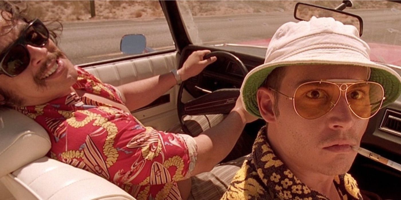 Johnny Depp and Benicio del Toro staring at the camera while on drugs in Fear and Loathing in Las Vegas
