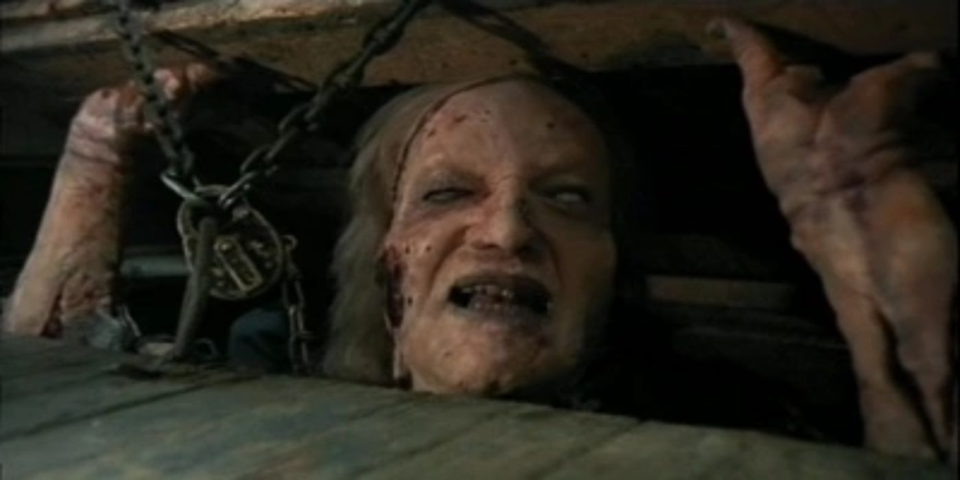 Ted Raimi as the possessed Henrietta in Evil Dead 2 (1987)