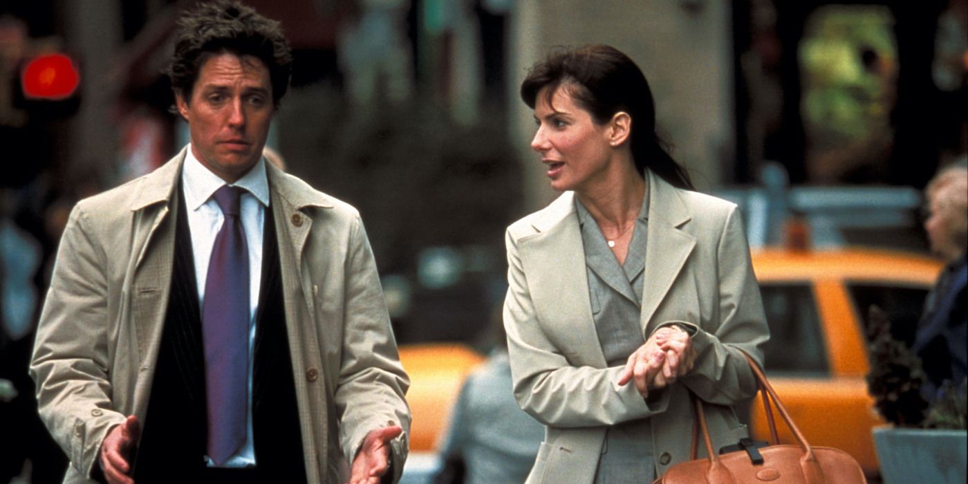 Hugh Grant as George and Sandra Bullock as Lucy taking a walk in the city in Two Weeks Notice