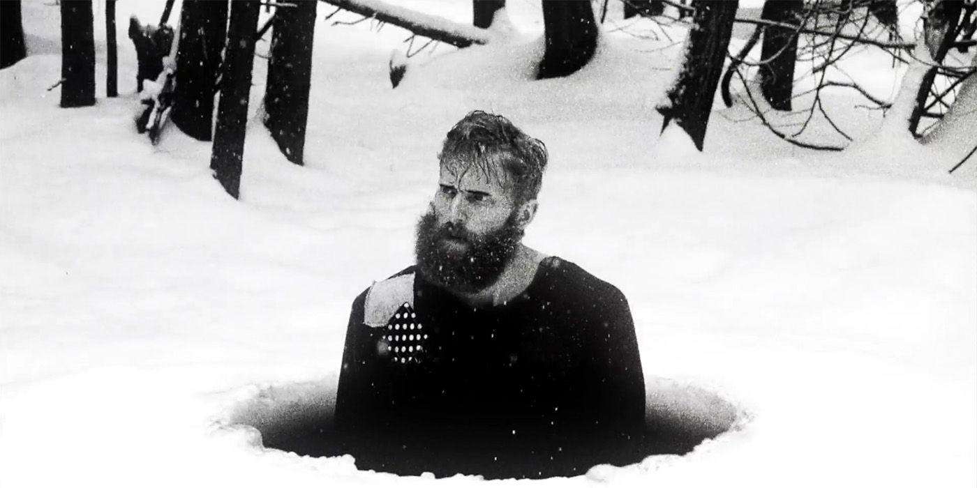 A man inside a hole in the ice in Hundreds of Beavers