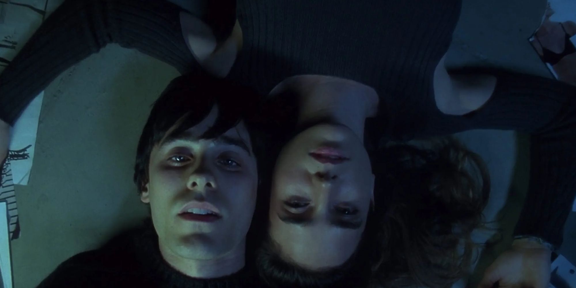 Jared Leto and Jennifer Connelly lying on the floor in Requiem for a Dream