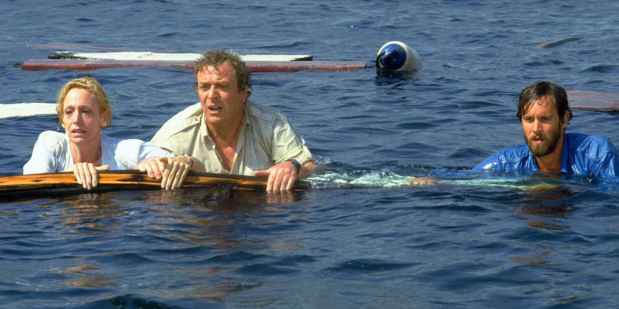 Ellen Brody (Lorraine Gray), Hoagie Newcombe (Michael Caine), and Michael Brody (Lance Guest) in 'Jaws: The Revenge'