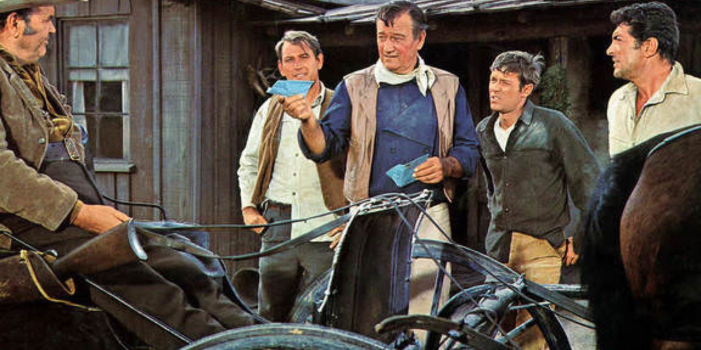 John Wayne and Dean Martin standing with a few men talking to a man in a horse and carriage in The Sons of Katie Elder