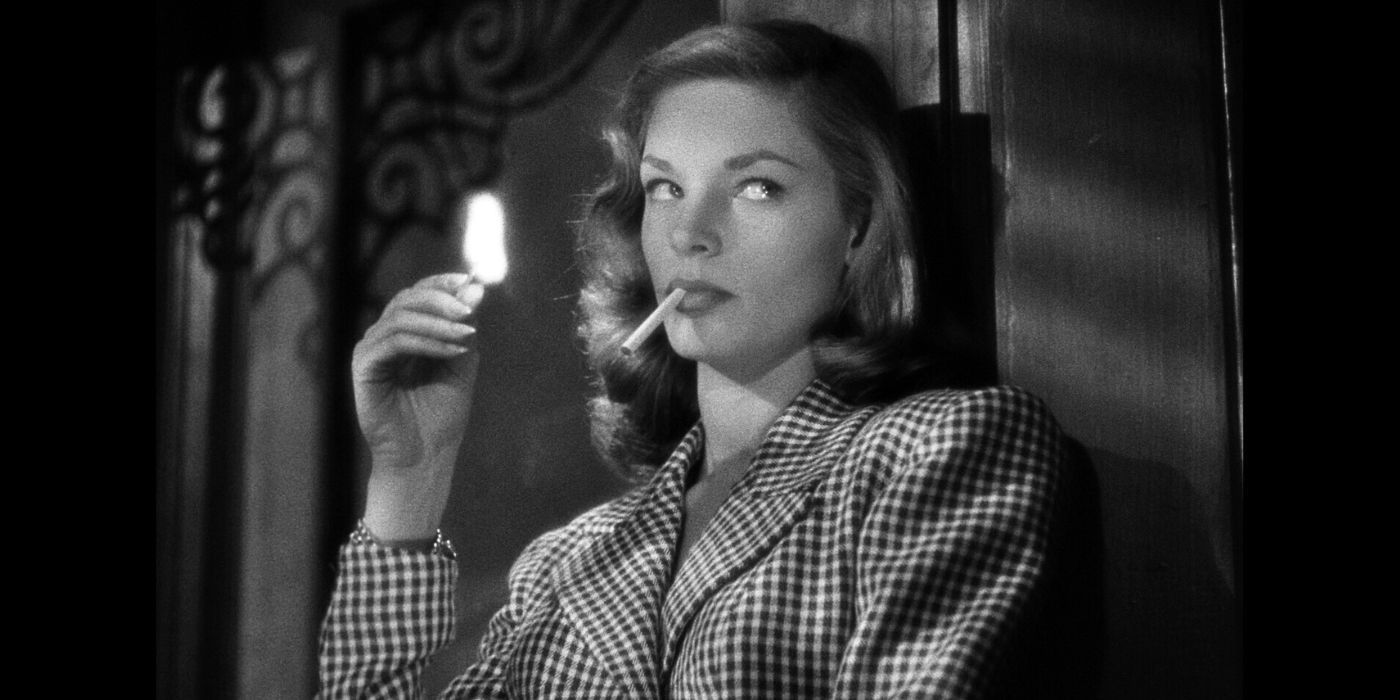 Lauren Bacall lighting a cigarette in To Have and Have Not