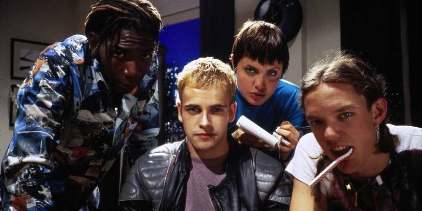 Laurence Mason, Jonny Lee Miller, Angelina Jolie, and Matthew Lillard look at the camera in Hackers.