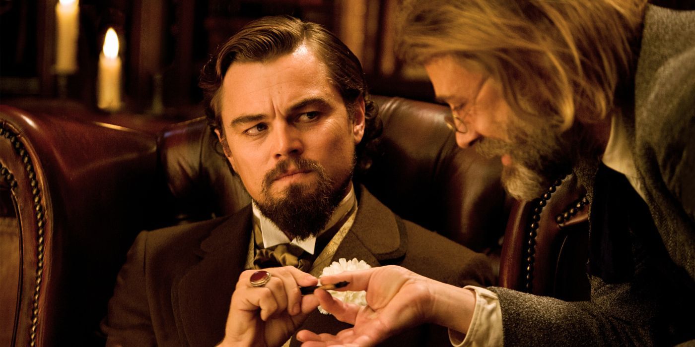 Leonardo DiCaprio taking a pen from Christoph Waltz in Django Unchained