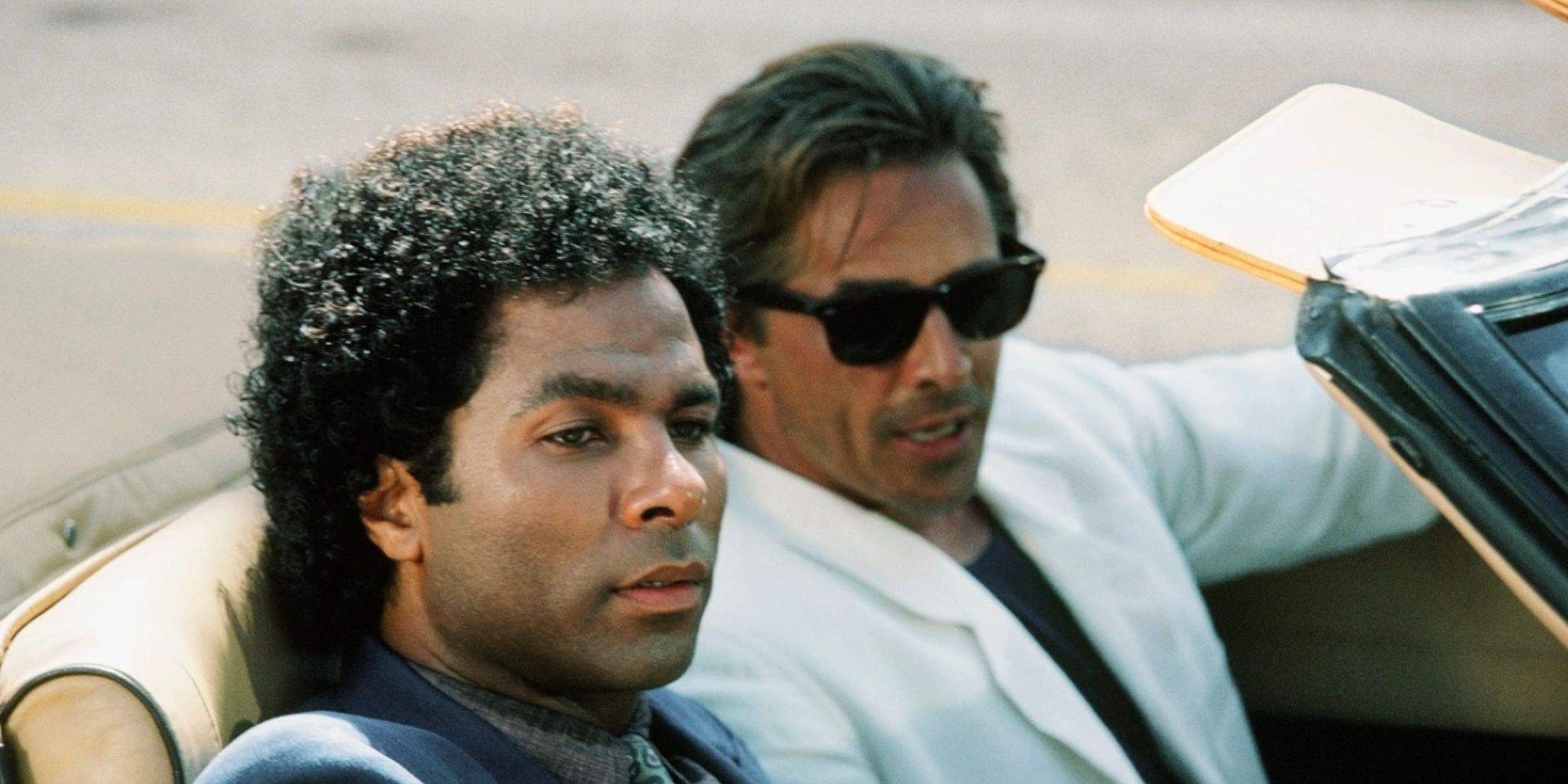 Philip Michael Thomas and Don Johnson in a car in Miami Vice