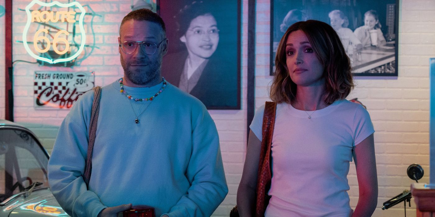 Seth Rogen and Rose Byrne in a neon lit room in Platonic