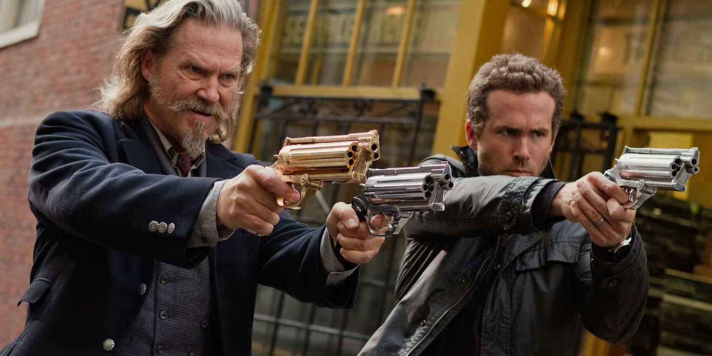 Jeff Bridges and Ryan Reynolds aiming their guns off-camera in R.I.P.D.