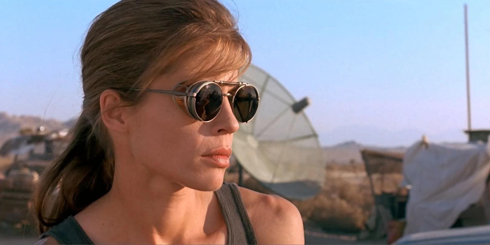 Linda Hamilton's Sarah Connor wearing sunglasses in the desert in Terminator 2: Judgment Day