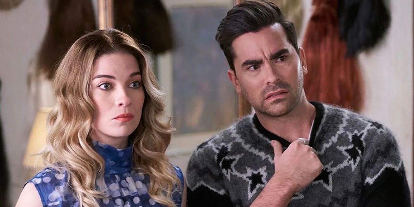Alexis and David from Schitt's Creek looking at something in shock and disgust.
