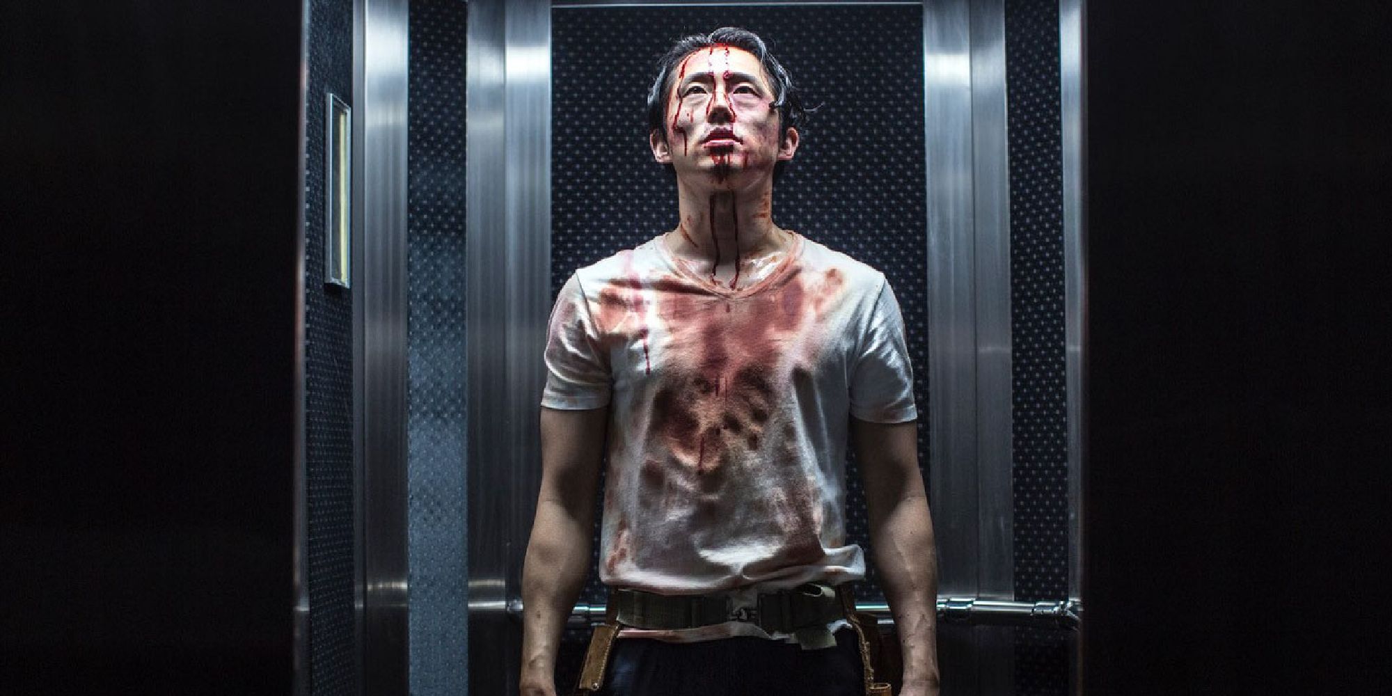 Steven Yeun covered in blood in Mayhem