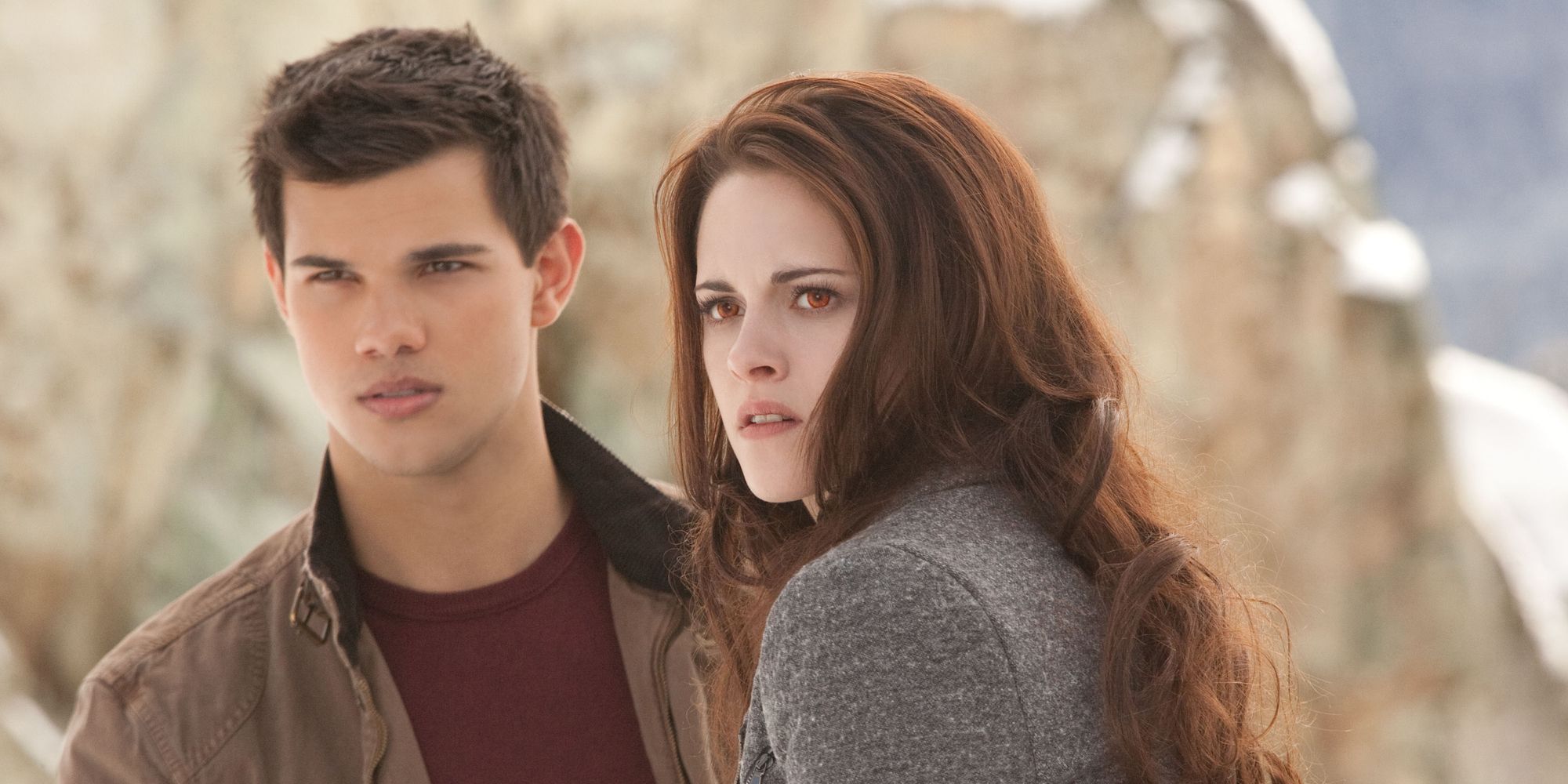 Jacob Black and Bella Swan looking in the same direction in Breaking Dawn Part 2