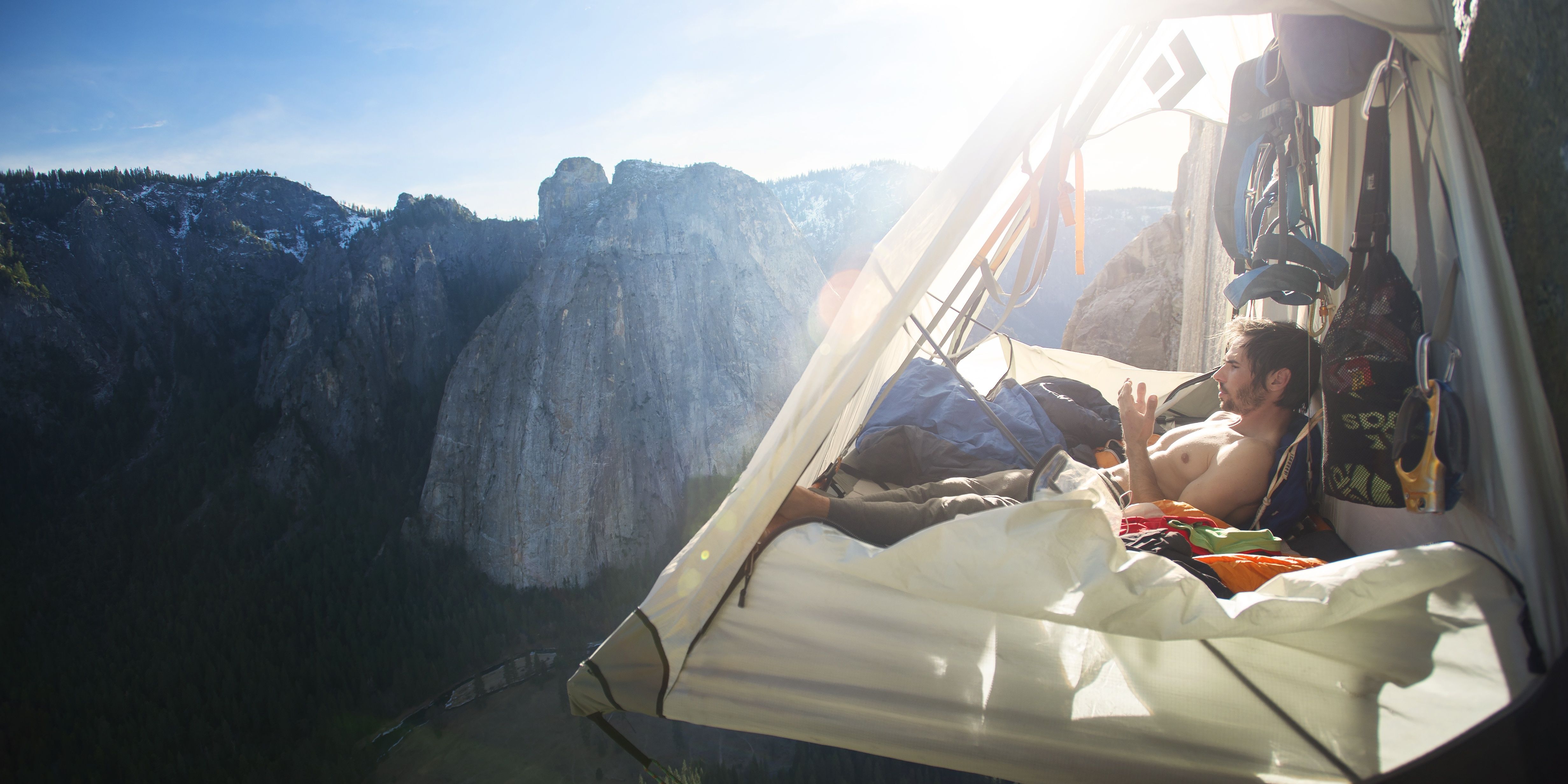 Tommy Caldwell camping on the side of a mountain in The Dawn Wall