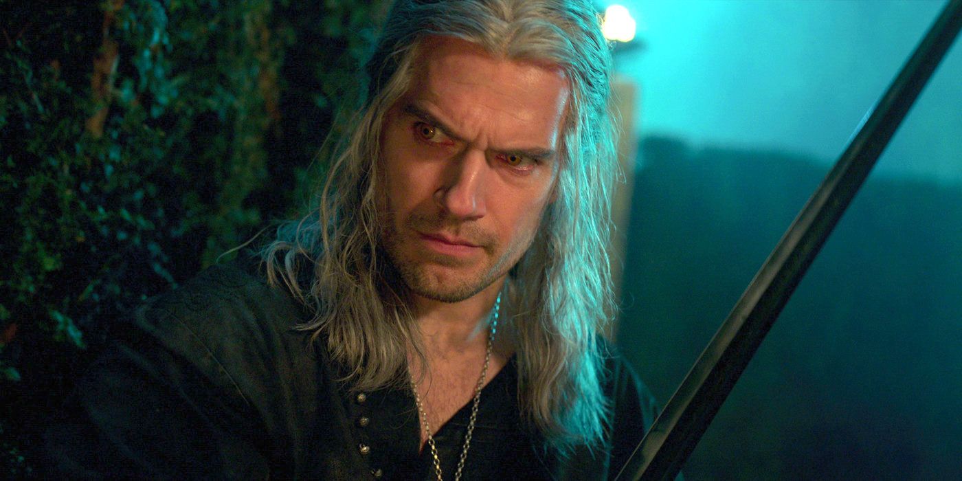 Henry Cavill as Geralt of Rivia wielding his sword in The Witcher.