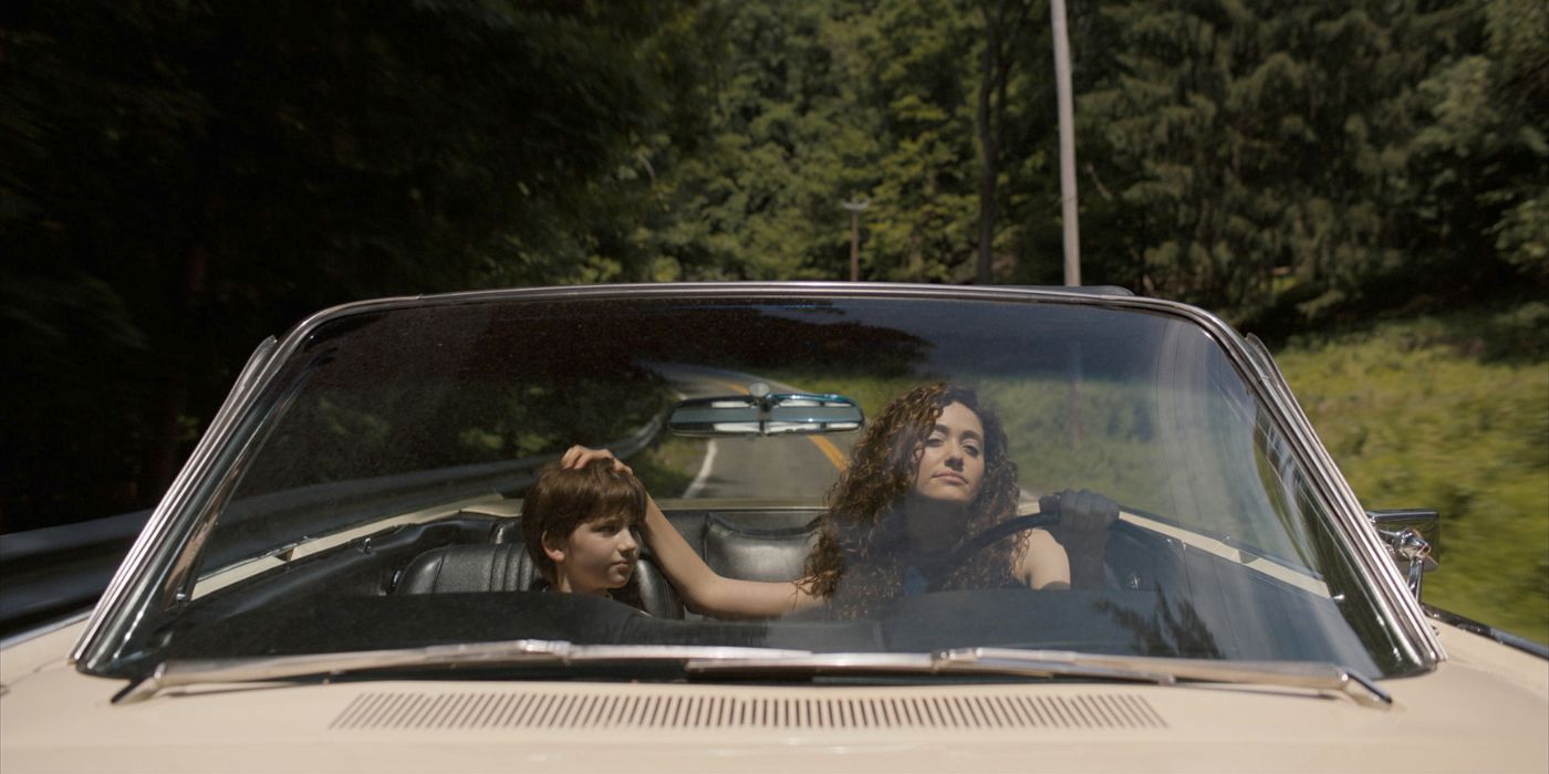 Zachary Golinger and Emmy Rossum as Danny and Candy Sullivan in a car in The Crowded Room