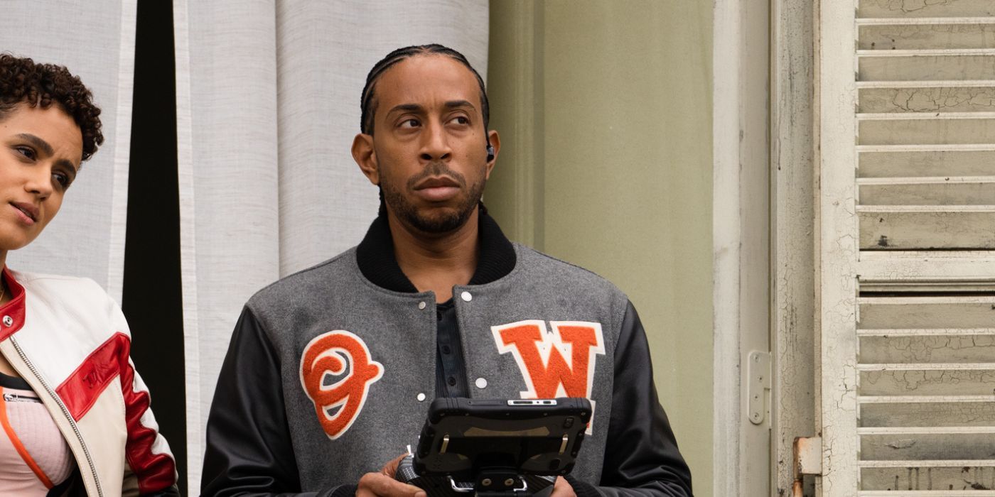 Ludacris as Tej holding a device in Fast X