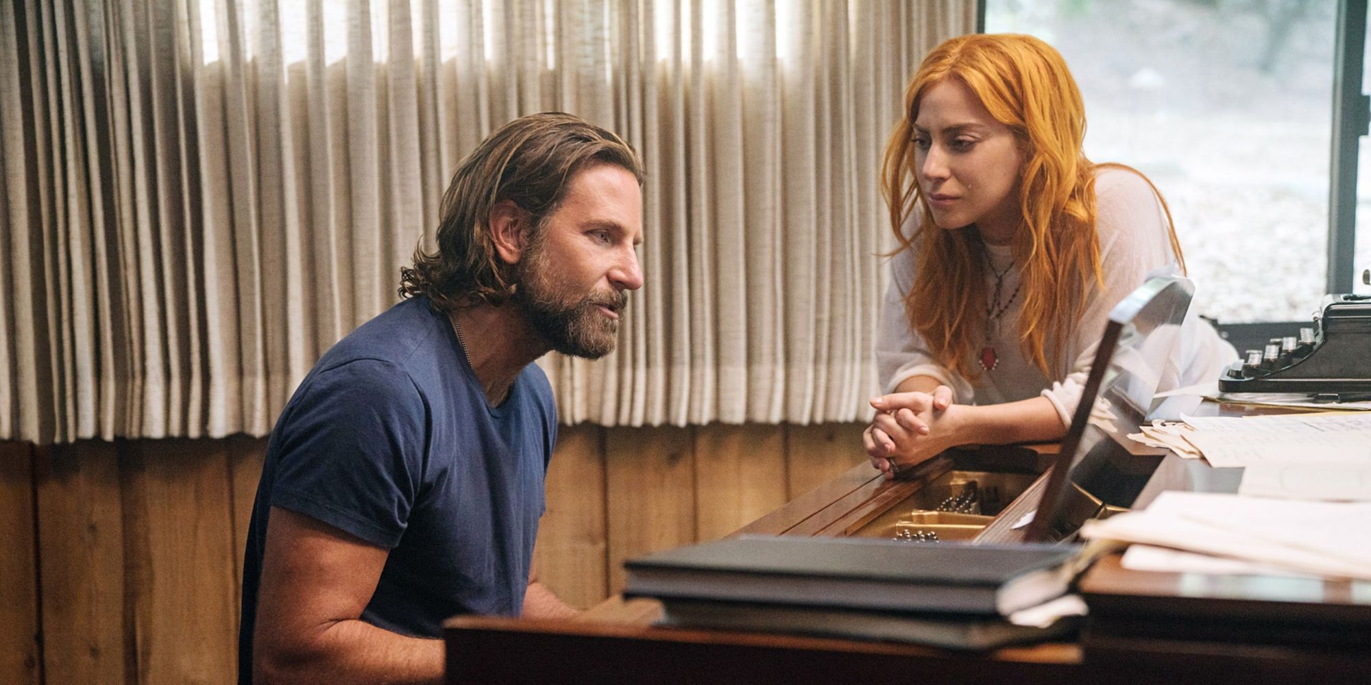 Jack Maine (Bradley Cooper) plays the piano with Ally (Lady Gaga) in A Star is Born (2018)