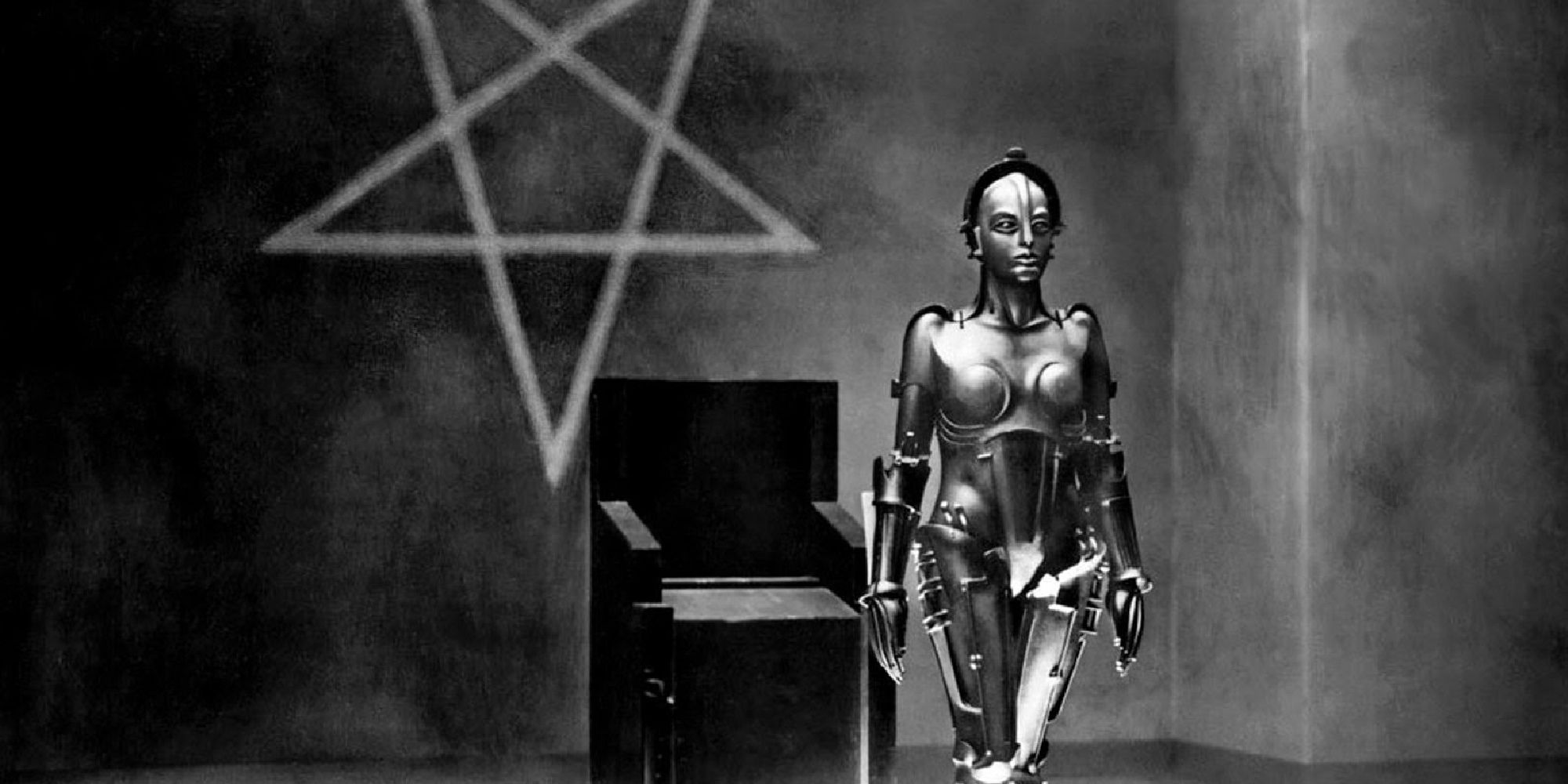 A black and white shot of a strange robot in Metropolis.