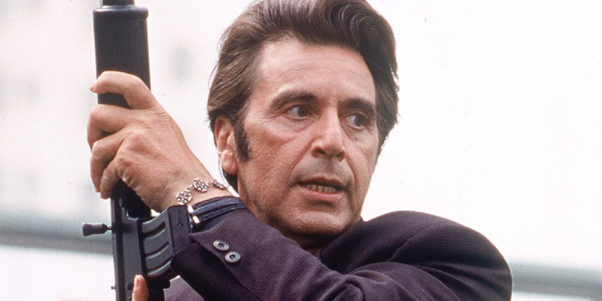 Al Pacino holding a gun in Heat