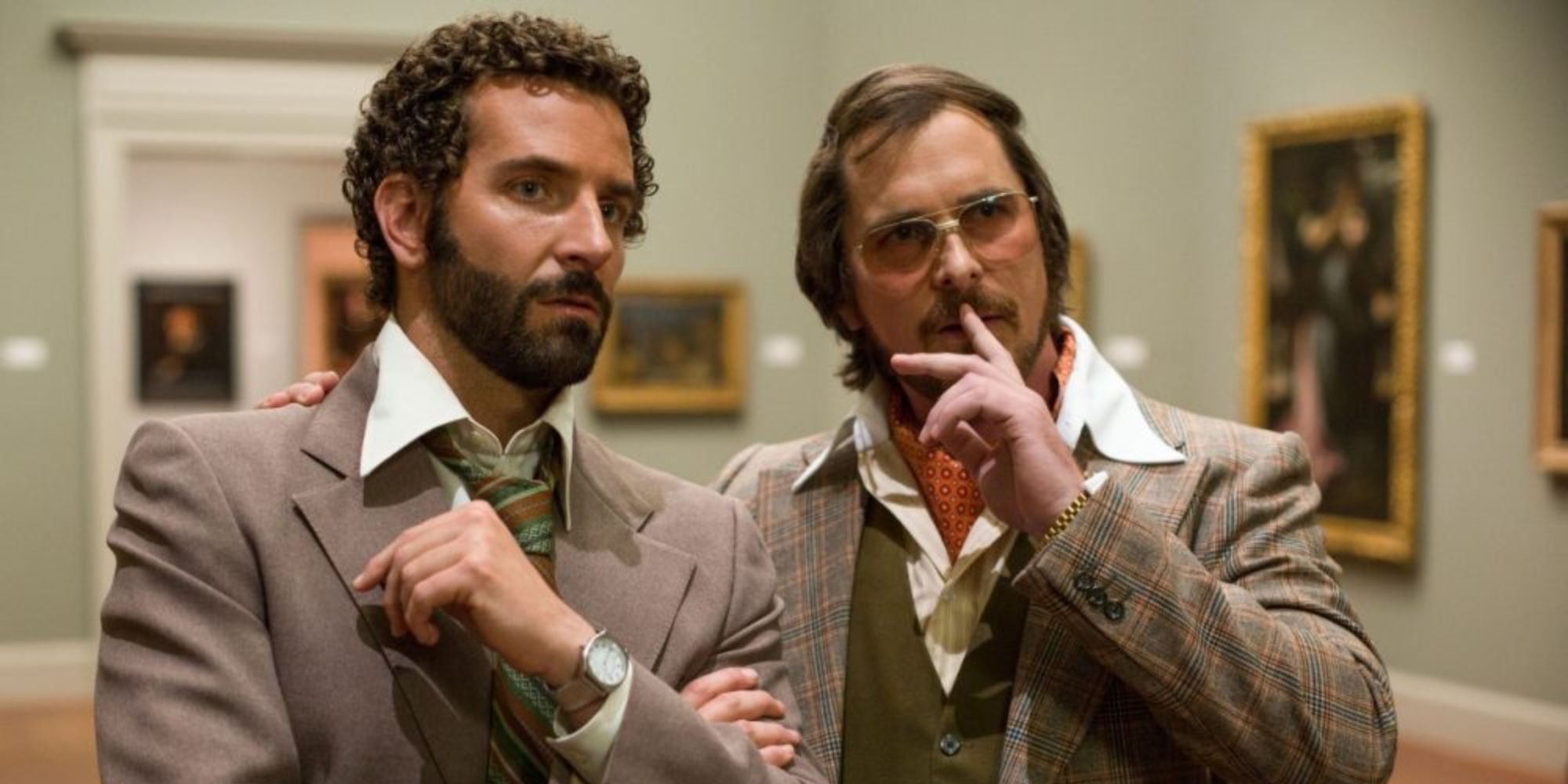 Richie DiMaso (Bradley Cooper) talks with Irving Rosenfeld (Christian Bale) in American Hustle (2013)