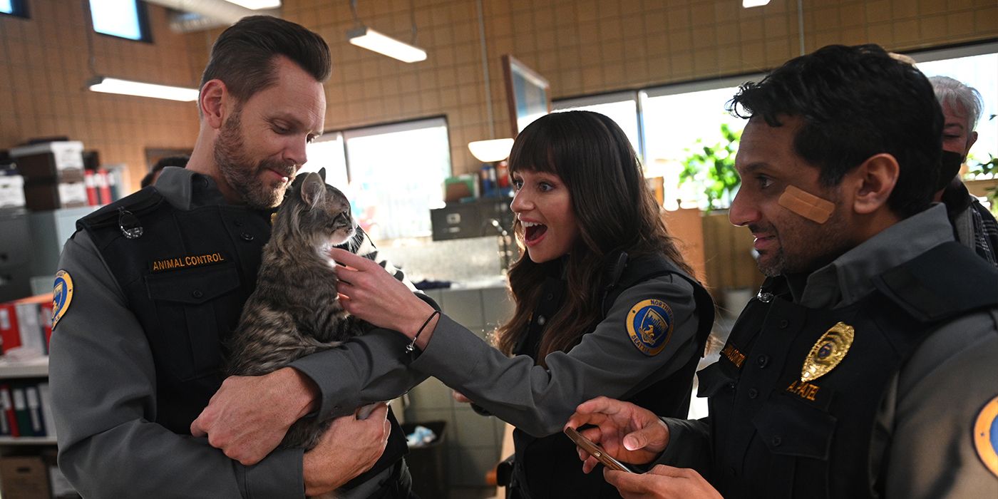 Joel McHale, Grace Palmer and Ravi Patel in a behind-the-scenes still from Animal Control