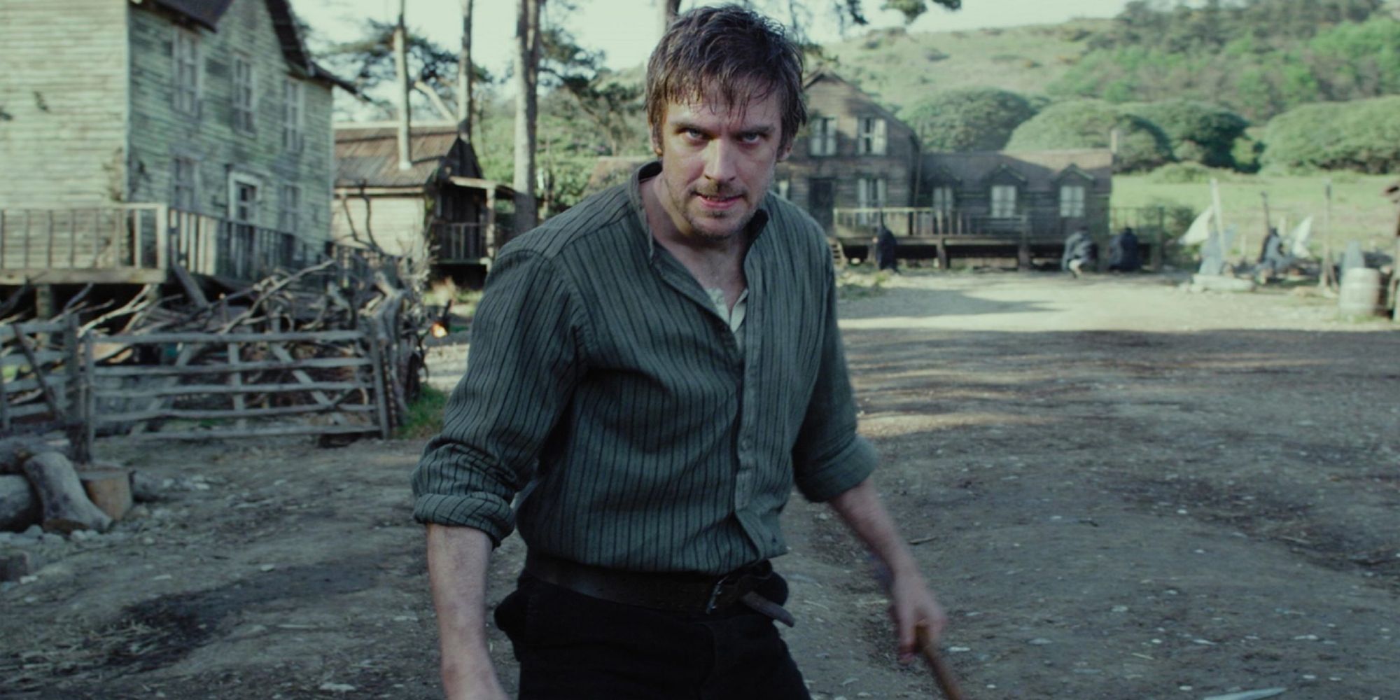 Thomas standing in the middle of the road looking menacing in Apostle