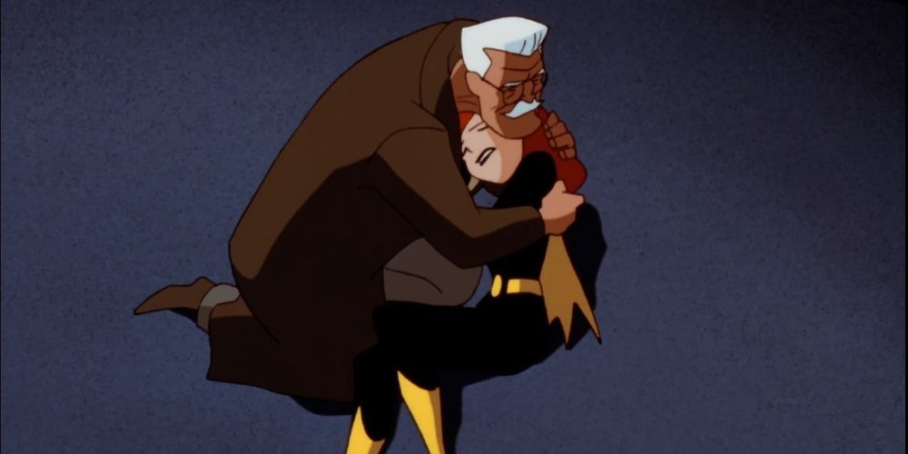 Jim Gordon holds the body of his daughter, Barbera, after learning she was Batgirl