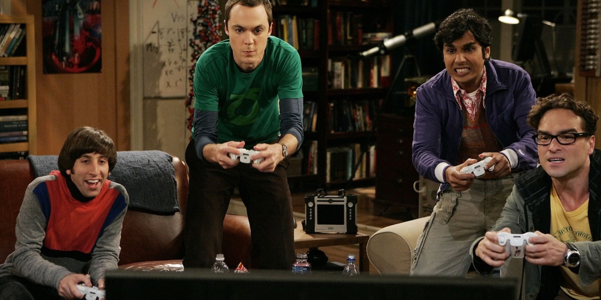 Howard, Sheldon, Raj, and Leonard playing video games