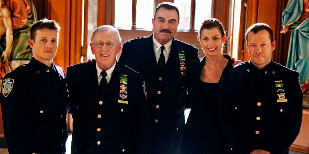 The Reagan family in their Blue Bloods uniforms. 