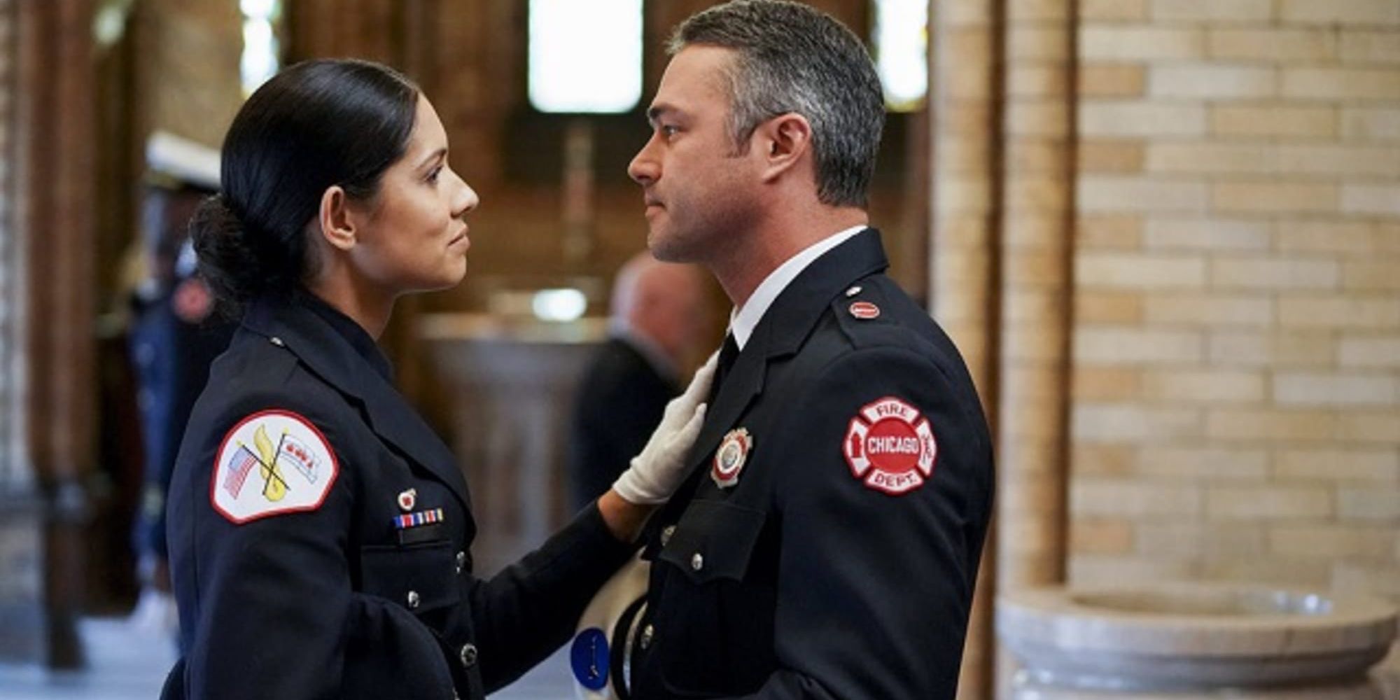 Stella Kidd and Kelly Severide look at one another in Season 7 of Chicago Fire