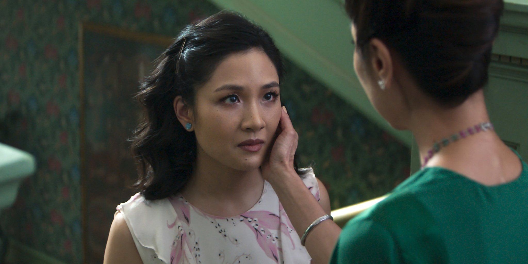 Michelle Yeoh places her hand on Constance Wu's face in 'Crazy Rich Asians'